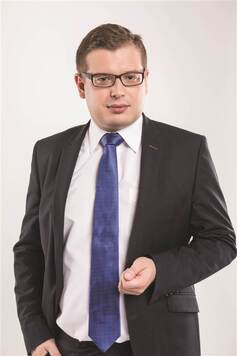Zdjęcie portretowe Krzysztofa Strzałkowskiego, radnego województwa mazowieckiego.